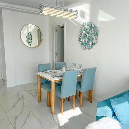 Апартаменти Sunrise Адехе